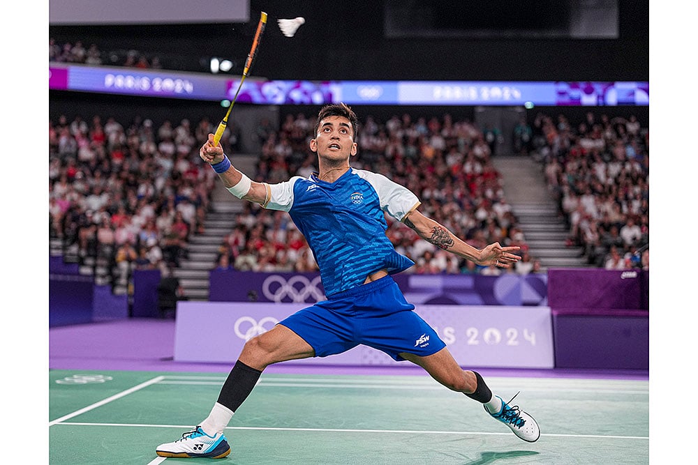 | Photo: PTI/Ravi Choudhary : India's Lakshya Sen returns to Malaysia's Lee Zii Jia